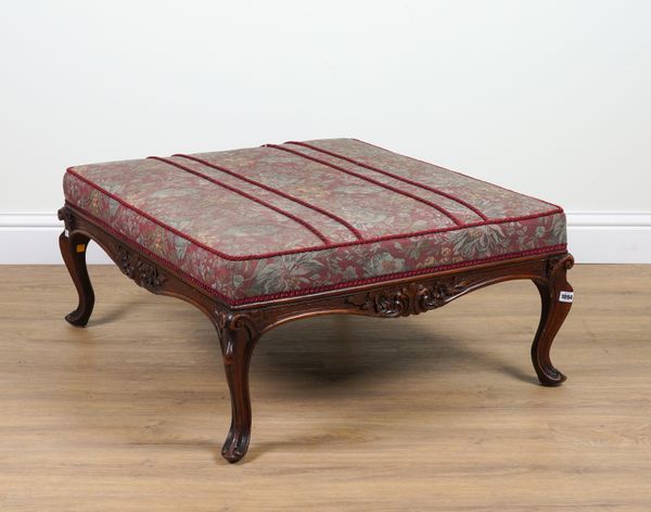 A LARGE 19TH CENTURY CARVED WALNUT SQUARE FOOTSTOOL ON SCROLL SUPPORTS