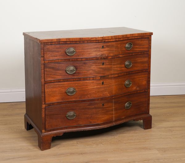 A GEORGE III INLAID MAHOGANY SERPENTINE CHEST OF FOUR LONG GRADUATED DRAWERS