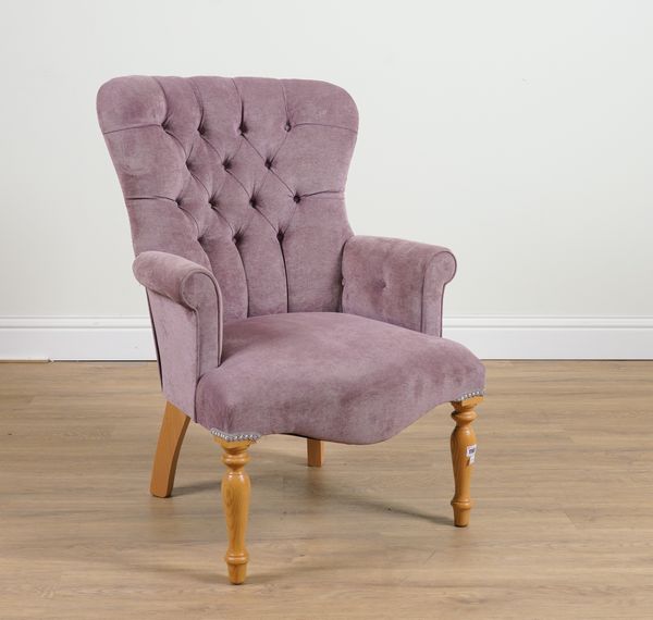 A VICTORIAN STYLE SPOONBACK EASY ARMCHAIR WITH PURPLE UPHOLSTERY ON TURNED BALUSTER SUPPORTS