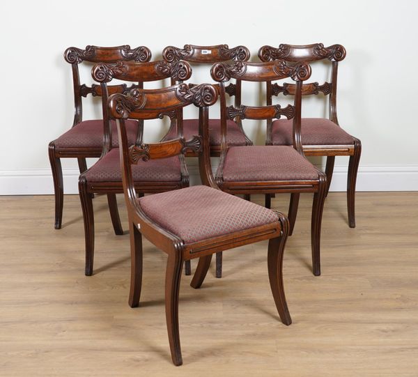 A SET OF SIX WILLIAM IV CARVED MAHOGANY TABLET BACK DINING CHAIRS (6)