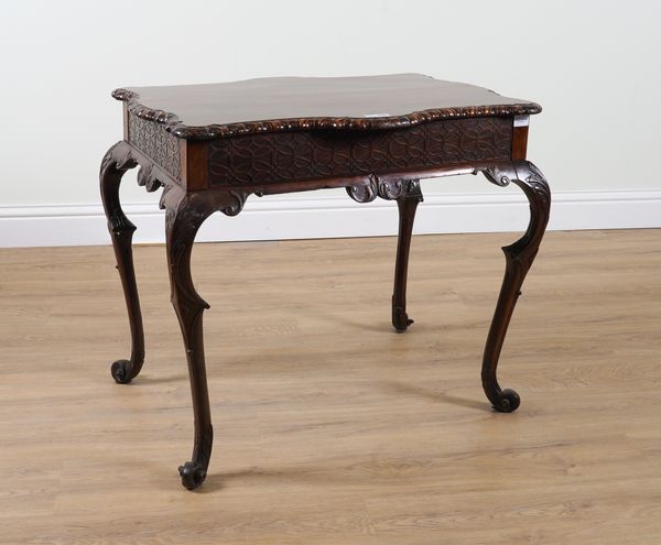 A PAIR OF 18TH CENTURY STYLE SHAPED AND CARVED MAHOGANY RECTANGULAR CENTRE TABLES ON SCROLL SUPPORTS (2)