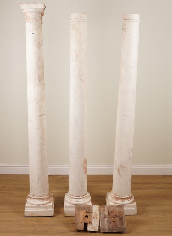 WITHDRAWN A SET OF THREE WHITE PAINTED PINE ARCHITECTURAL COLUMNS WITH DORIC CAPITALS (4)