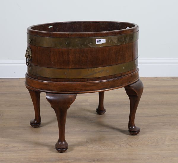 AN 18TH CENTURY COOPERED OAK OVAL WINE COOLER ON LATER STAND