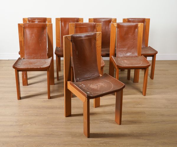 ROLAND HAEUSLER FOR MAISON REGAIN; A SET OF EIGHT ELM FRAMED LEATHER SEATED DINING CHAIRS (8)