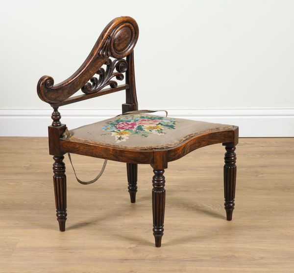 A MID 19TH CENTURY FAUX ROSEWOOD ASYMMETRIC SIDE CHAIR ON REEDED SUPPORTS