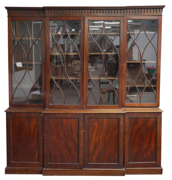 A 19TH CENTURY MAHOGANY BREAKFRONT BOOKCASE CABINET