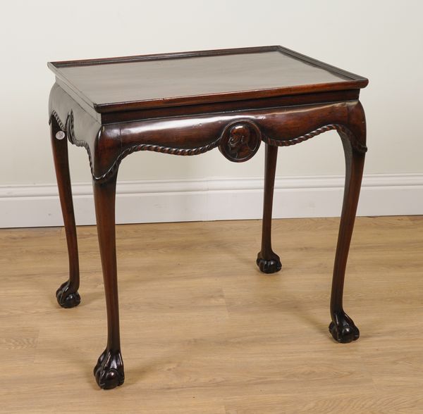 AN 18TH CENTURY STYLE RECTANGULAR MAHOGANY SILVER TABLE ON CLAW AND BALL FEET