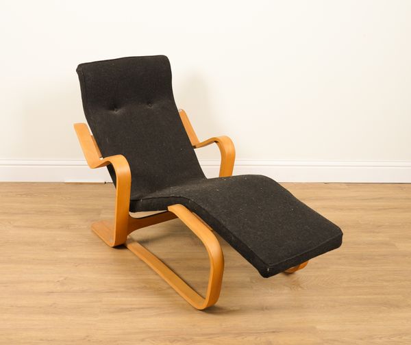 AFTER MARCEL BREUER; A LAMINATED BEECH RECLINING CHAIR