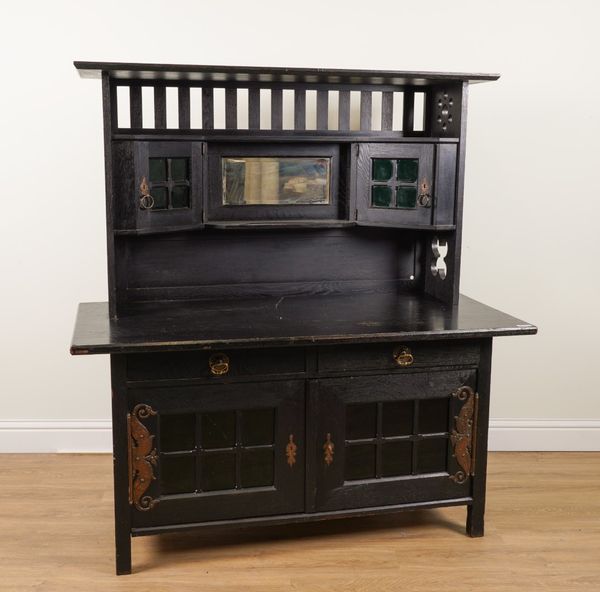 IN THE MANNER OF M H BAILLIE SCOTT; AN ARTS AND CRAFTS EBONISED OAK DRESSER