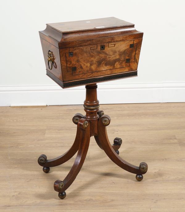 A REGENCY BRASS INLAID MAHOGANY SARCOPHAGUS FORM TEAPOY ON FOUR DOWNSWEPT SUPPORTS