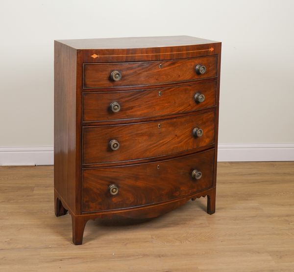 A REGENCY INLAID MAHOGANY BOWFRONT FOUR DRAWER CHEST OF DRAWERS