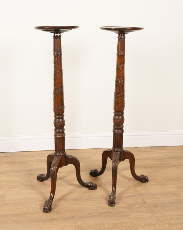 A PAIR OF 18TH CENTURY STYLE MAHOGANY TRIPOD TORCHERE STANDS WITH IVORY CARVED COLUMNS (2)