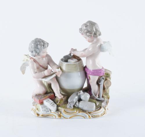 A MEISSEN GROUP OF TWO TRADING PUTTI