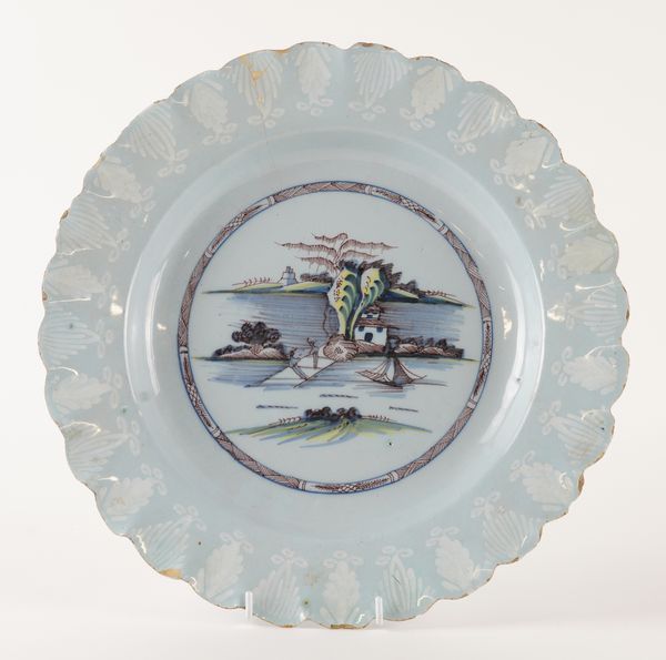 A LARGE BRISTOL DELFTWARE DISH