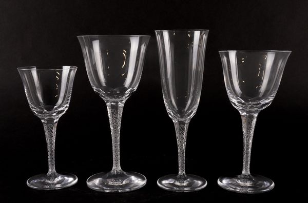 A SUITE OF TWENTY FOUR LALIQUE `TREVES' PATTERN  DRINKING GLASSES