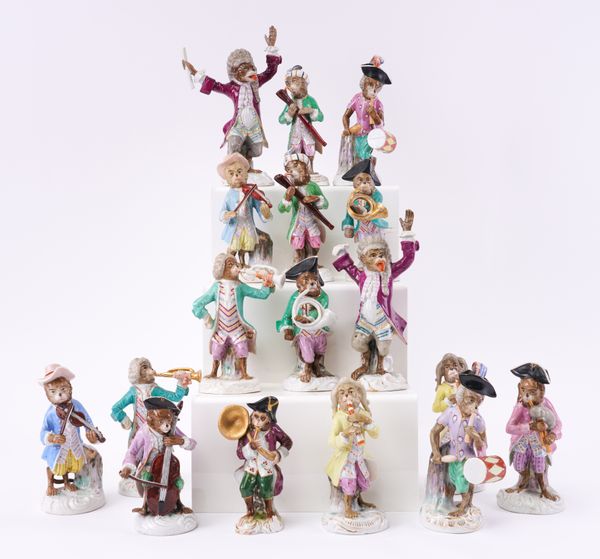 A GROUP OF SEVENTEEN GERMAN PORCELAIN MONKEY BAND FIGURES (17)