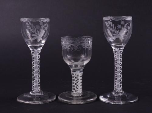 A PAIR OF ENGRAVED OPAQUE TWIST WINE GLASSES