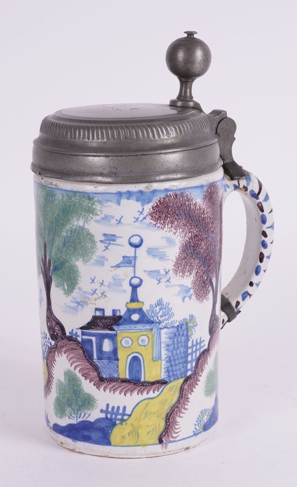 A GERMAN FAIENCE TANKARD