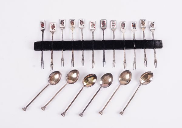 A SET OF TWELVE SILVER AND ENAMELLED COCKTAIL STICKS AND A SET OF SIX SILVER AND ENAMELLED COFFEE SPOONS (2)