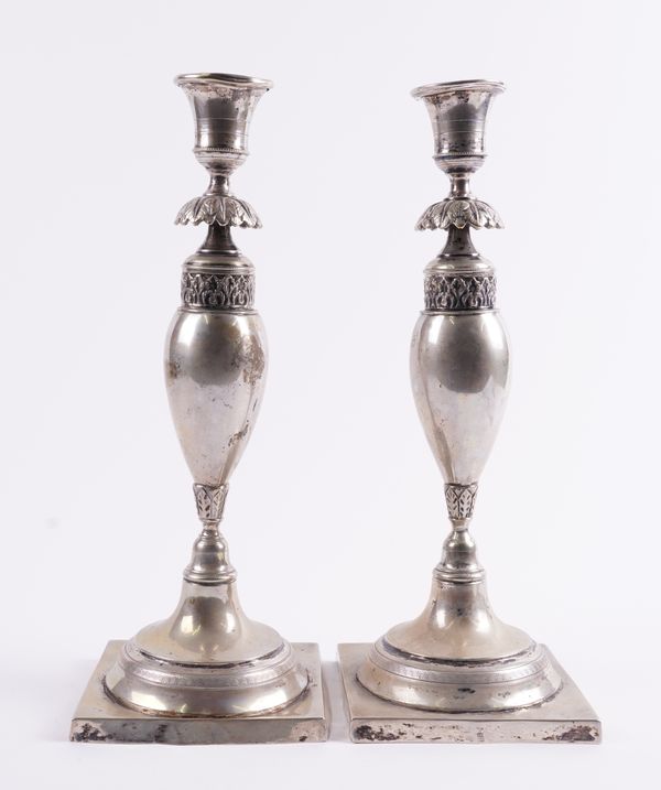 A PAIR OF EUROPEAN TABLE CANDLESTICKS