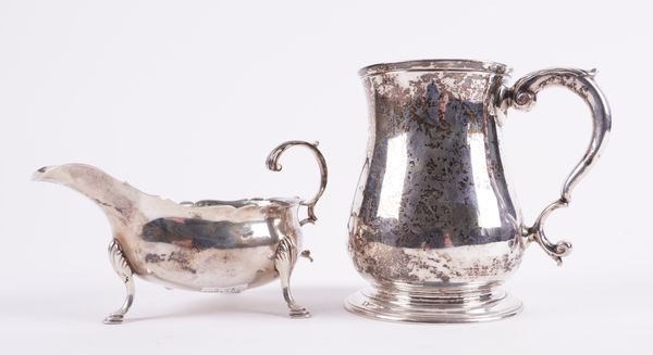 A SILVER MUG AND A SILVER SAUCEBOAT (2)