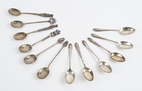 TWO SETS OF SIX TEASPOONS (2)