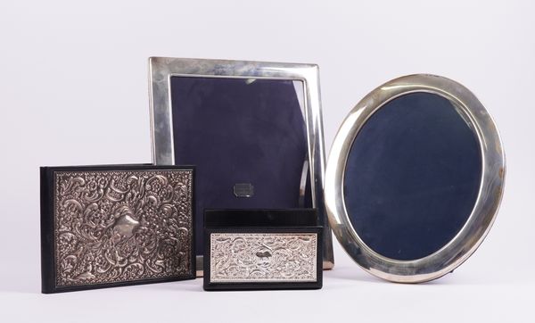 TWO SILVER MOUNTED PHOTOGRAPH FRAMES AND TWO SILVER MOUNTED DESK ACCESSORIES