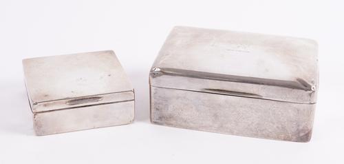 TWO SILVER CIGARETTE BOXES AND A PLATED CIGARETTE BOX (3)