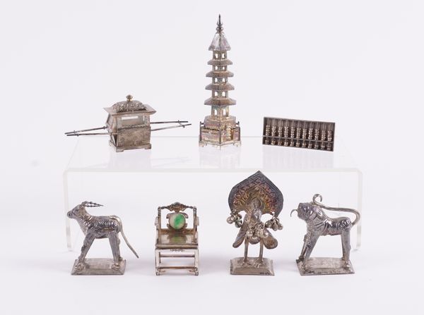 A GROUP OF SEVEN ASIAN ORNAMENTS (7)