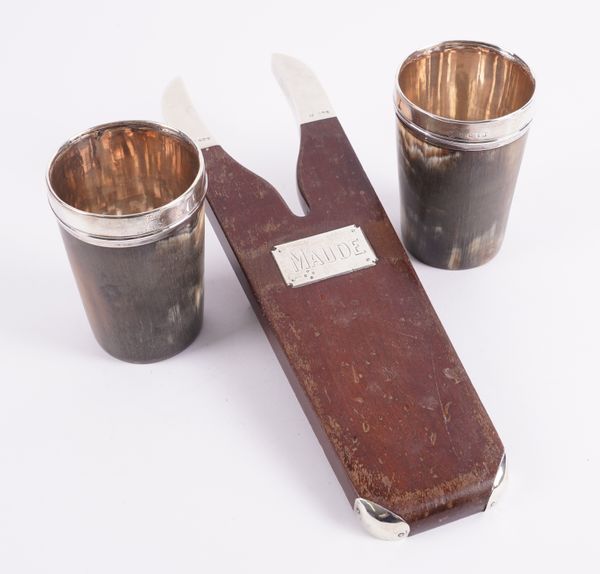 A PAIR OF SILVER MOUNTED HORN BEAKERS AND A SILVER MOUNTED BOOT JACK (3)