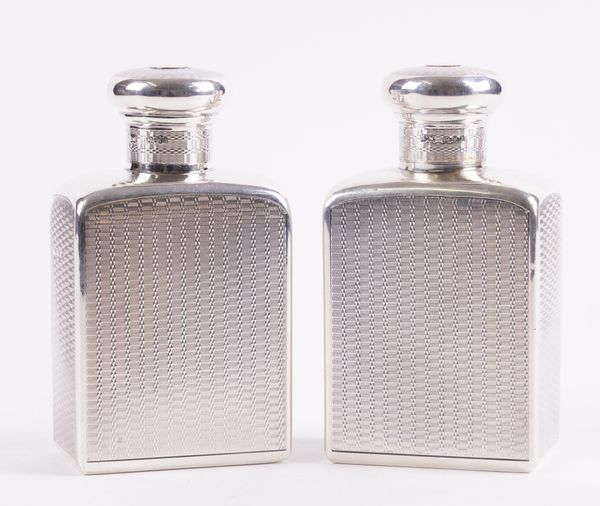 A PAIR OF SILVER TOILET BOTTLES (2)