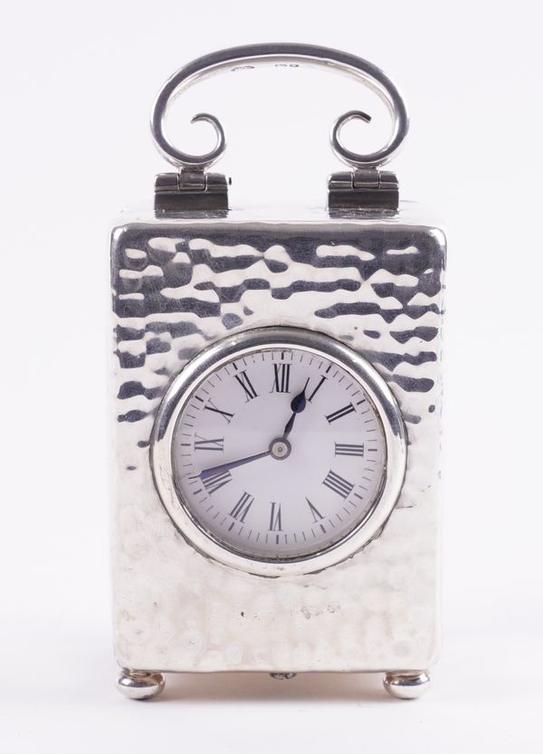 A SILVER RECTANGULAR CASED CARRIAGE CLOCK TIMEPIECE