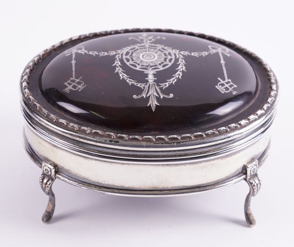 A TORTOISESHELL AND SILVER PIQUE OVAL JEWELLERY BOX