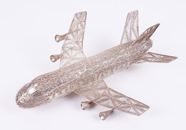 A FILIGREE MODEL OF A JET AEROPLANE