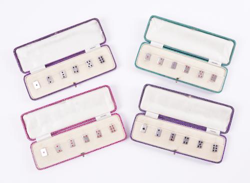 A SET OF FOUR AMNORA CASES OF SIX SILVER AND ENAMELLED CUP TOKENS (4)