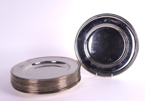 A SET OF TWELVE SILVER PLATES (12)