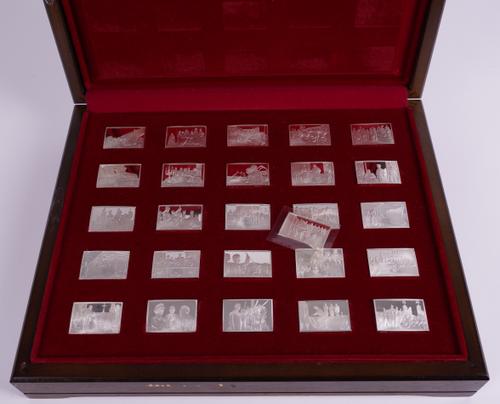 A CASED SET OF TWENTY-FIVE SILVER RECTANGULAR INGOTS AND ONE ADDITIONAL SILVER INGOT