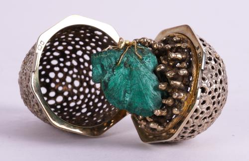 A STUART DEVLIN SILVER GILT AND MALACHITE EGG