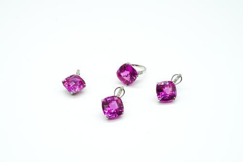 A SYNTHETIC PINK SAPPHIRE AND DIAMOND SET OF JEWELLERY (3)