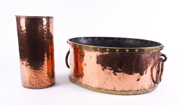 A COPPER AND BRASS RIVETED JARDINIERE OR WINE COOLER (2)