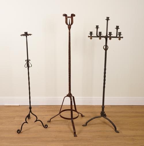 THREE WROUGHT-IRON FLOOR STANDING CANDELABRA (3)