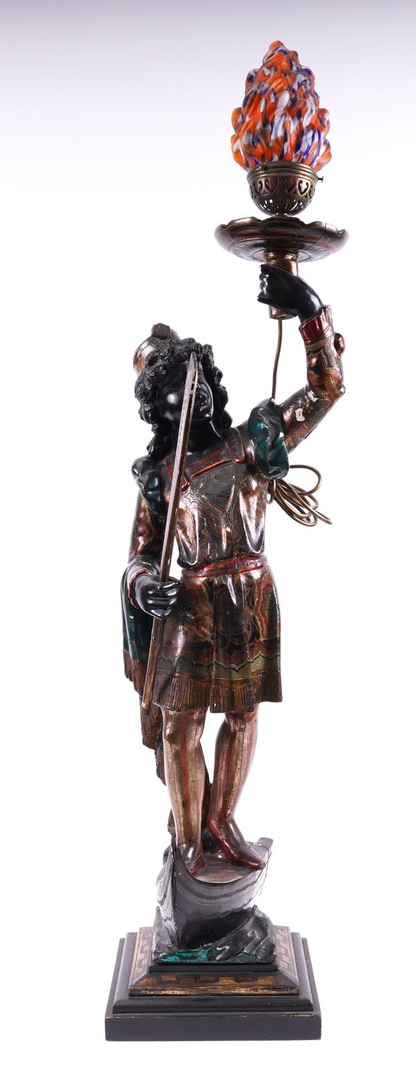 A VENETIAN GILT AND POLYCHROME DECORATED GONDOLA TORCHERE FIGURE