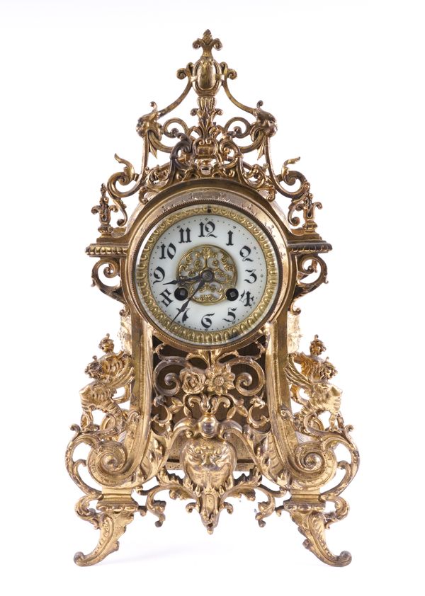 A FRENCH GILT-METAL MOUNTED MANTEL CLOCK