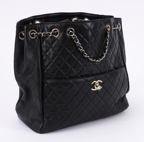 CHANEL: A BLACK DRAWSTRING BUCKET BAG