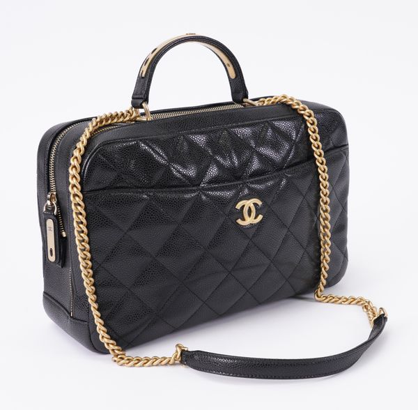 CHANEL: A QUILTED BLACK BOWLING BAG