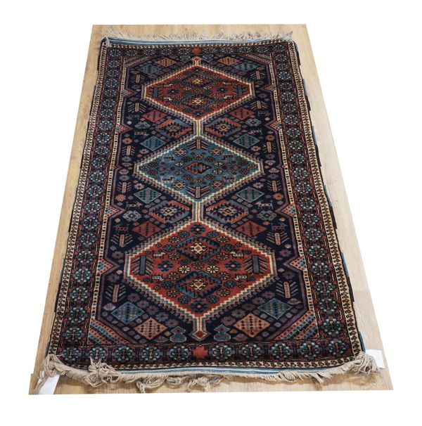 A MODERN TURKISH RUG OF CAUCASIAN DESIGN