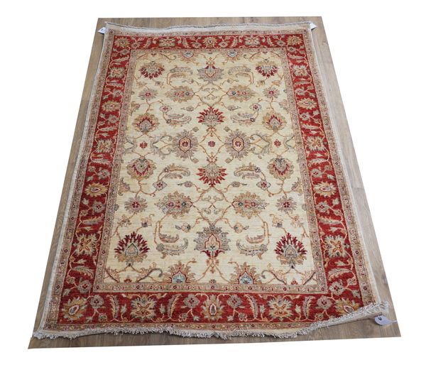 A MODERN PART SILK AFGHAN RUG OF PERSIAN DESIGN