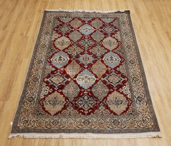 A FINE PART SILK NAIN PERSIAN RUG