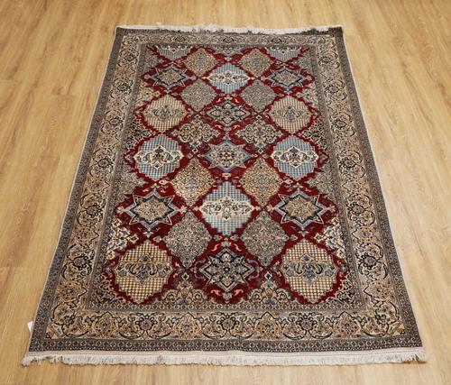 A FINE PART SILK NAIN PERSIAN RUG