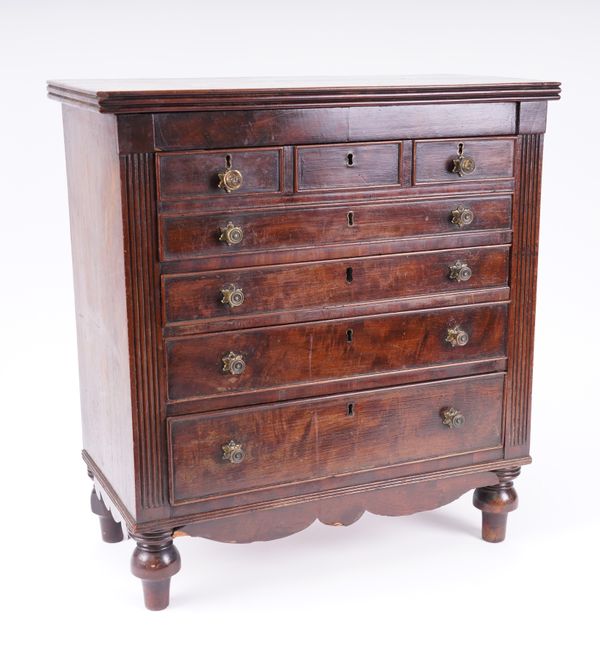 A 19TH CENTURY MINIATURE MAHOGANY FOUR DRAWER CHEST OF DRAWERS